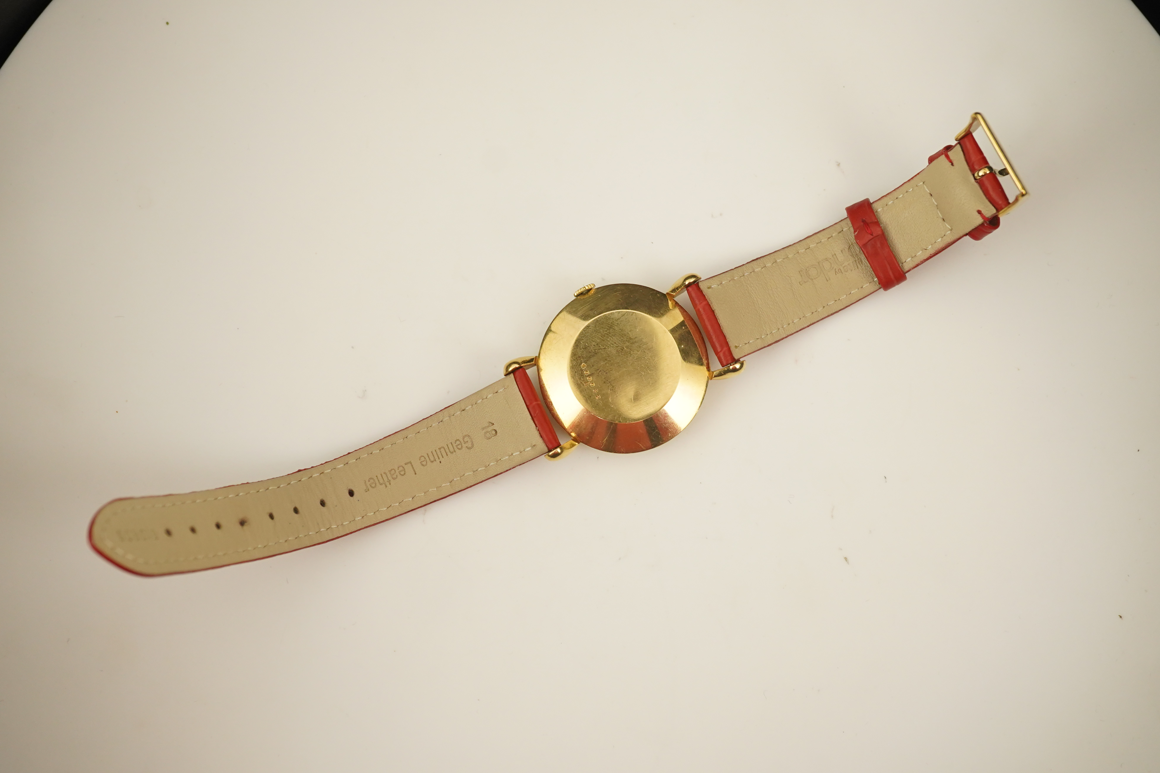 A gentleman's 1950's 18ct gold Jaeger LeCoultre manual wind wrist watch, on a later associated leather strap